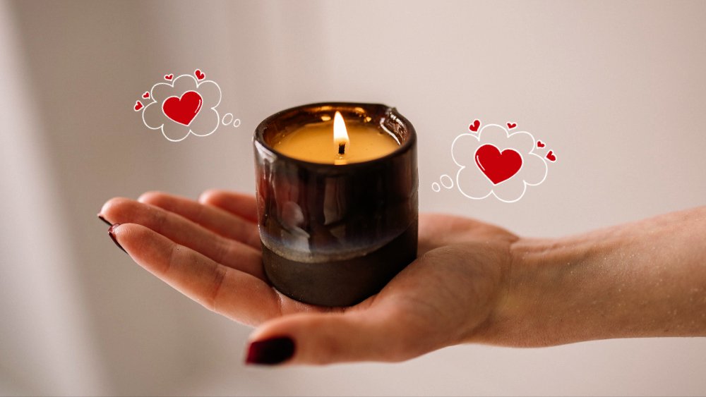 Candele romantiche si trasformano in caldi oli da massaggio